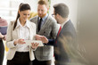© BGStock72 - Group of businesspeople standing in the modern office