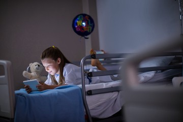 Sticker - Patient using digital tablet in ward