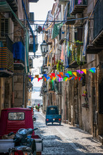 Narrow Cefalu Street View With Car Parked