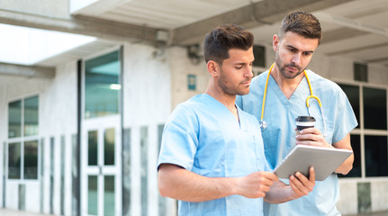 male nurse with stethoscope  and tablet