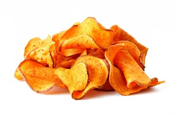 Pile of healthy sweet potato chips isolated on a white background