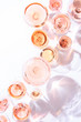 Many glasses of rose wine at wine tasting. Concept of rose wine and variety