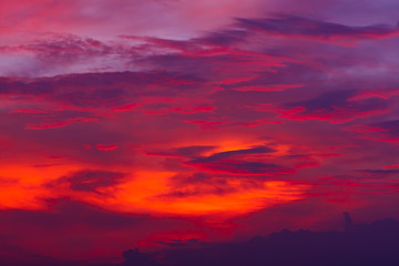 Wall Mural - Nature background. Red sky at night and clouds. Beautiful and colorful sunset time.