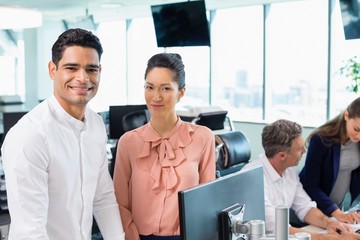 Wall Mural - Portrait of smiling business colleagues 