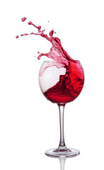 Splash of red wine in glass