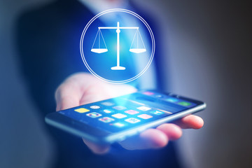 Poster - Businessman hand holding mobile phone with justice icon
