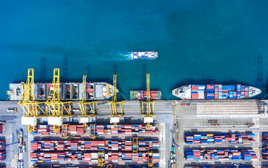 Wall Mural - container ship in import export and business logistic.By crane ,Trade Port , Shipping.cargo to harbor.Aerial view.Top view.