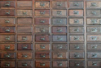 Old rustic cabinets with small compartments