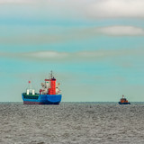 Fototapeta Desenie - Blue cargo ship entering the Baltic sea. Riga, Europe
