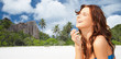 © Syda Productions - happy smiling young woman on tropical beach