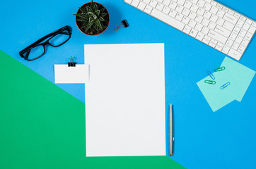 Leinwandbilder - Mock-up magazine or catalog on colorful table. White page or notepad on modern background. Blank copy space for mockups or simulations.