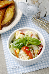 Wall Mural - Vegetable salad decorated with basil leaf