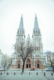 Fototapeta Boho - entrence of Gothic Church in cold spring day