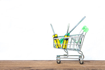 heardware tool in cart on wood and white background