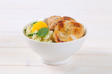 Canvas Print - roasted chicken breast with rice and oranges