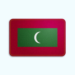 Sticker - National flag of Maldives islands with denim texture and orange seam. Realistic image of a tissue made in vector illustration.