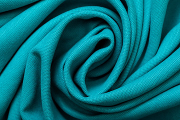 drapery of turquoise fabric