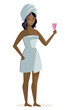 © matiasdelcarmine - african woman holding a menstrual cup after a shower