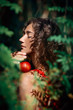 © zolotareva_elina - beautiful young woman in forest with apple portrait