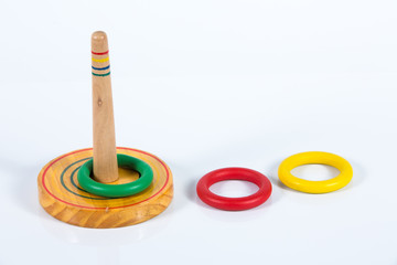 Quoits, wooden toy isolated on white background