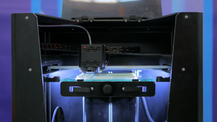 Three dimensional printing machine. 3D printer during work