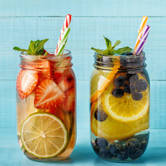 Detox fruit infused water. Refreshing summer homemade cocktail