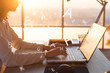 © undrey - Female hands on keyboard texting using laptop and internet, working online. Freelancer typing at office, workplace.