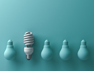 Poster - One eco energy saving light bulb different and stand out from old incandescent lightbulbs on green background with shade and shadow , individuality and different creative idea concept . 3D rendering.