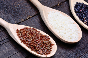 Poster - Various types of rice in a wooden spoons