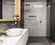 Marble mosaic herringbone tiled shower feature in a contemporary ensuite bathroom