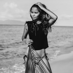 Canvas Print - Beautiful female model posing on a beach