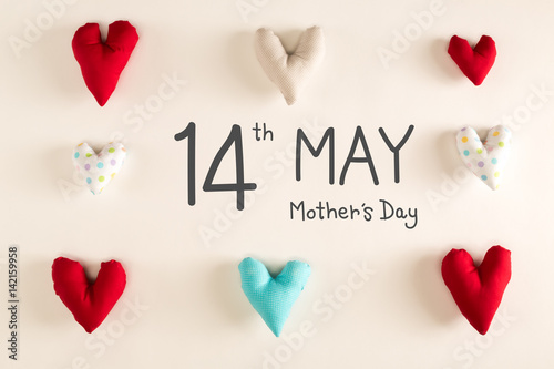 Poster Mother's Day message with blue heart cushions