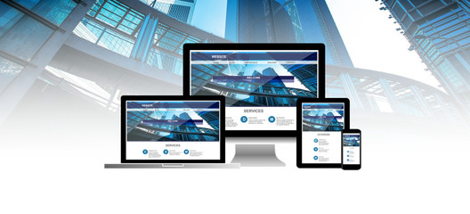 website on computer laptop tablet phone with background skyscraper
