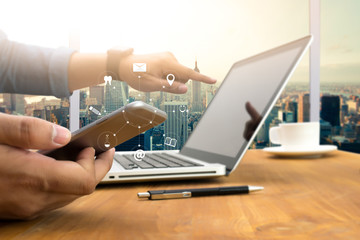 man hand holding smartphone device and  technology , businessman working with modern devices, digital tablet computer and mobile phone.