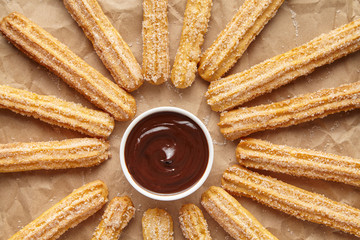 Wall Mural - churros traditional spain breakfast or lunch street fast food baked sweet dough snack dessert with c