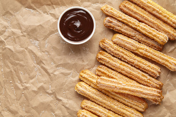 Wall Mural - churros traditional homemade spain breakfast or lunch meal street fast food baked sweet dough snack 