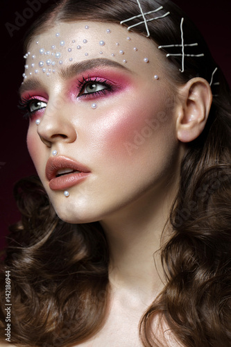 Obraz na plátně Beautiful girl with perfect art makeup and pearl beads