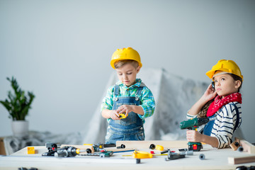 Wall Mural - Boy and girl with tools