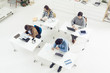 © LStockStudio - College Students Studying