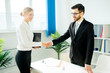 © Nichizhenova Elena - Manager and candidate shaking hands