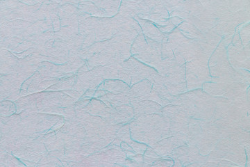 Pattern of light blue mulberry paper texture.