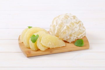 Poster - peeled and sliced pomelo