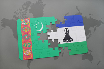puzzle with the national flag of turkmenistan and lesotho on a world map