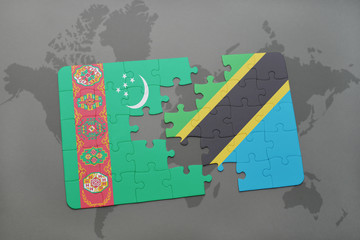 puzzle with the national flag of turkmenistan and tanzania on a world map