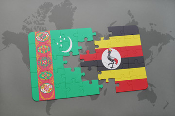 puzzle with the national flag of turkmenistan and uganda on a world map
