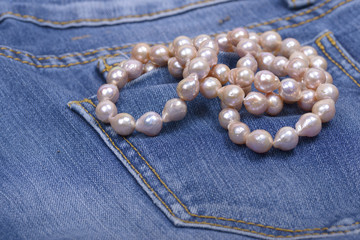 Jeans and Pearl Necklace