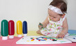 Sensory stimulation in infants, fine motor skills, painting