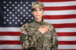 © Africa Studio - Female soldier on USA flag background