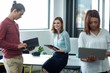 © WavebreakMediaMicro - Business executive using laptop and digital tablet