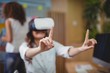 © WavebreakMediaMicro - Female business executive using virtual reality headset